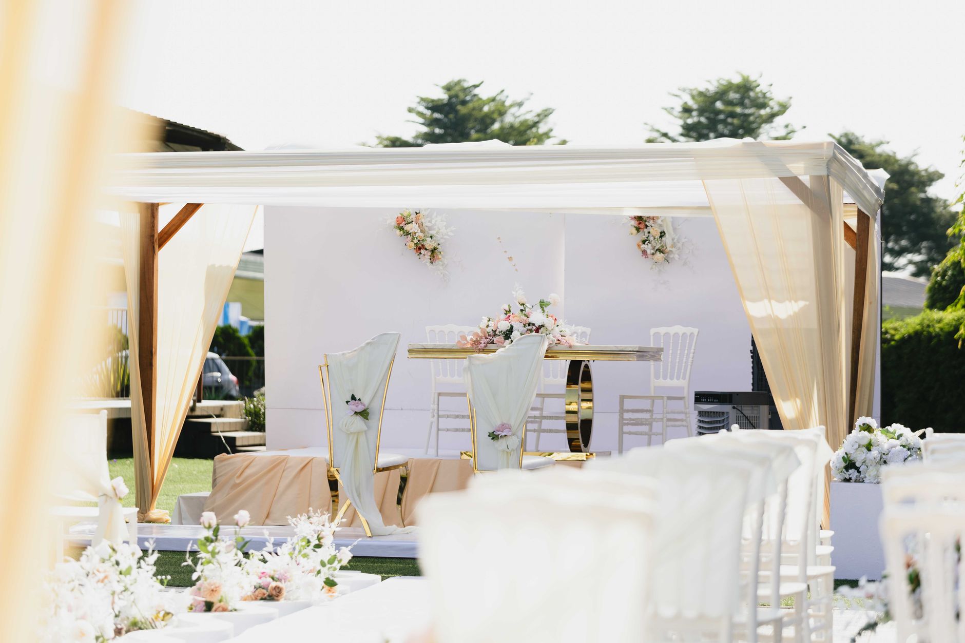 Outdoor wedding ceremony white pastel setting